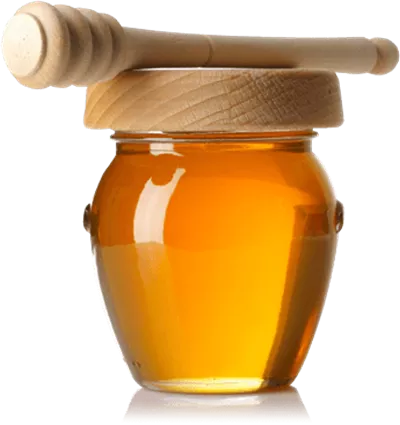 عکس دوربری ظرف شیشه ای با در چوبی عسل صبحانه و قاشق چوبی مخصوص روی شیشه
