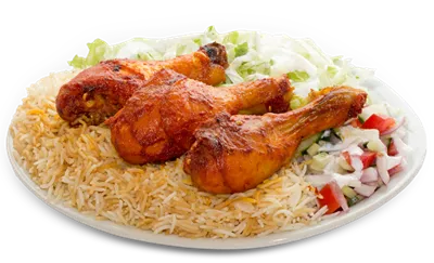 عکس دوربری شده ران مرغ روی برنج با سالاد