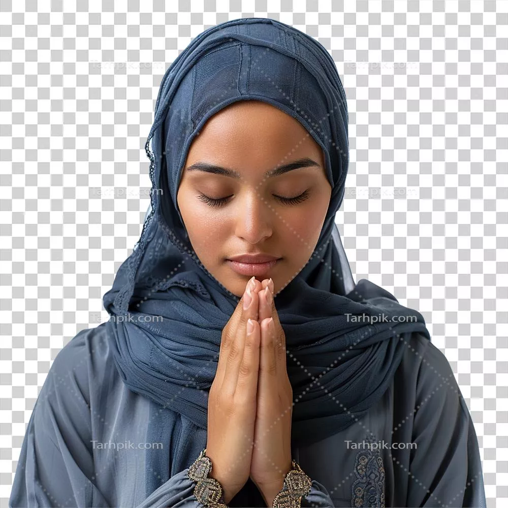 عکس دوربری زنی با شال آبی در حال دعا کردن با دستانی به هم پیوسته