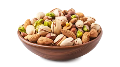 عکس دوربری مخلوطی از بادام، پسته و فندق در یک کاسه شفاف و زیبا