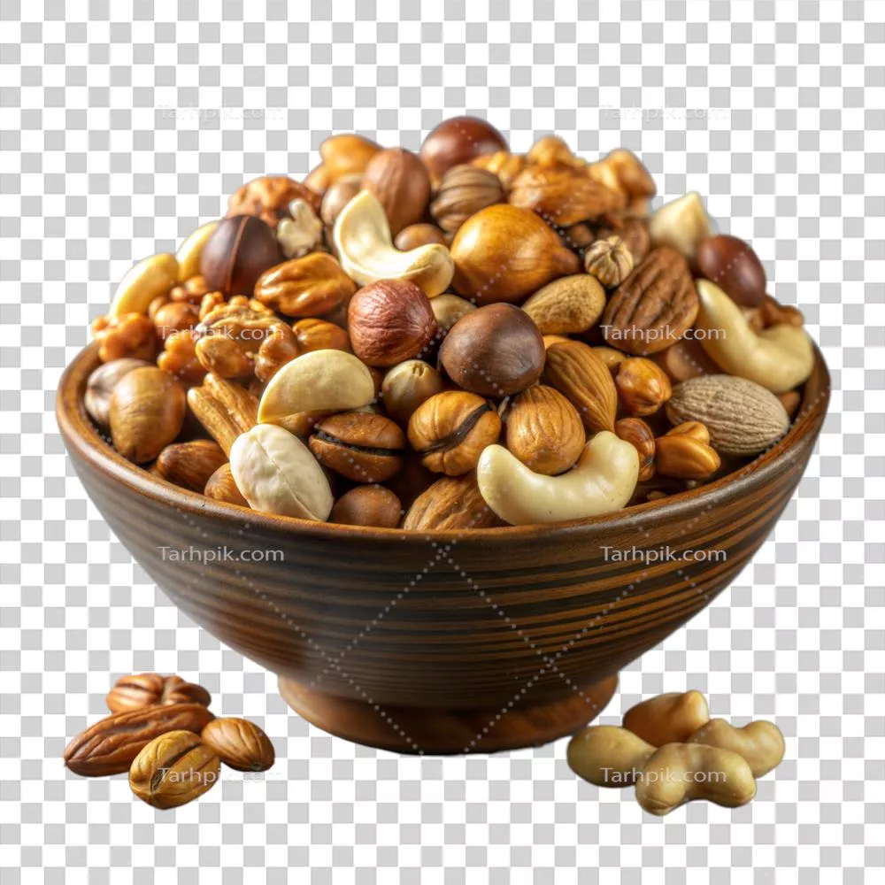 عکس دوربری مخلوطی از آجیل های خوشمزه در یک کاسه تزئینی با طراحی زیبا