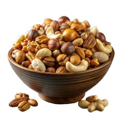 عکس دوربری مخلوطی از آجیل های خوشمزه در یک کاسه تزئینی با طراحی زیبا