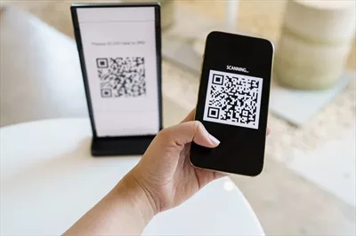 عکس پرداخت دیجیتال با کد QR: تجربه ای نوین در خریدهای آنلاین و بدون پول نقد