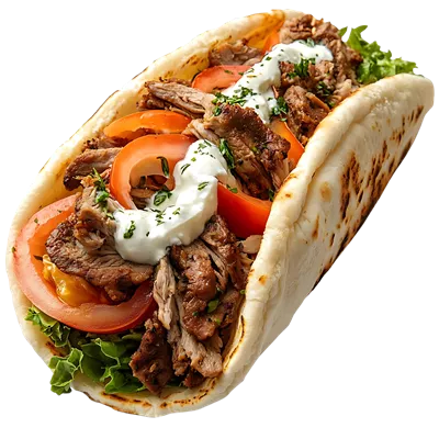 عکس دوربری غذای خوشمزه: ژیرو با گوجه فرنگی، کاهو و سس تزاتزیکی در پس زمینه شفاف