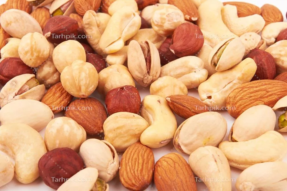 عکس تصویری زیبا از مغزهای خوراکی به عنوان پس زمینه ای جذاب