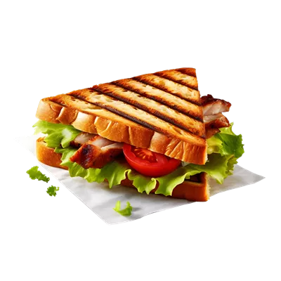 عکس دوربری ساندویچ خوشمزه حاوی ژامبون، پنیر و سبزیجات بر روی بشقاب کاغذی