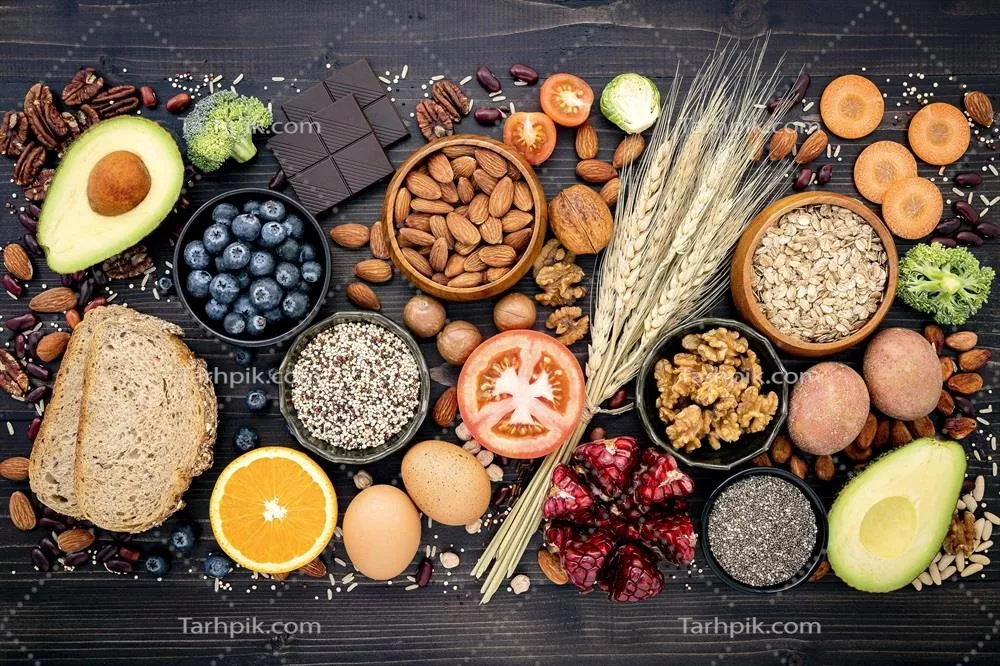 عکس نمایی از غذاهای سالم بر روی پس زمینه سنگی تیره و زیبا