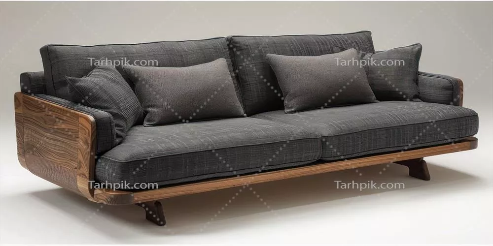 عکس مبل خاکستری شیک با قاب چوبی و کوسن های تزئینی در پس زمینه ای ملایم
