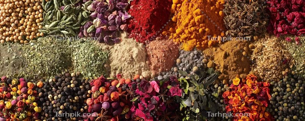 عکس ترکیب رنگارنگ ادویه جات و گیاهان خشک در یک تصویر زیبا
