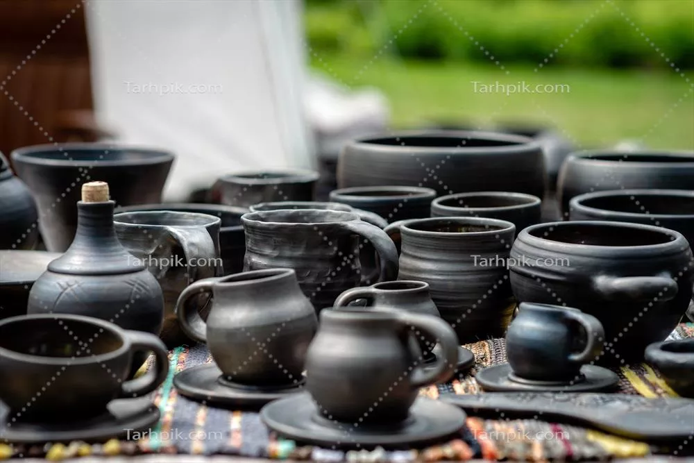 عکس گلدان های سفالی دست ساز طبیعی از سرزمین لتونی با طراحی هنری