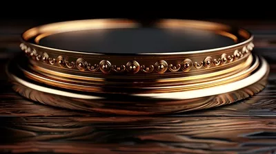 عکس تصویری زیبا از حلقه طلایی بر روی میز چوبی با طراحی سه بعدی