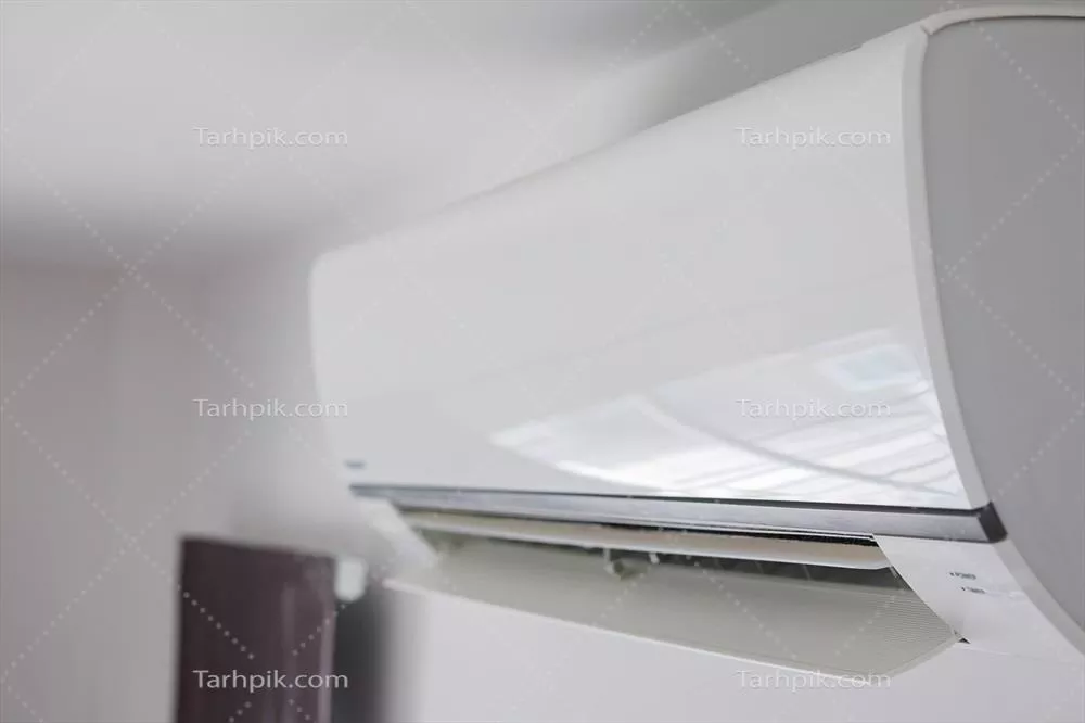 عکس دستگاه تهویه مطبوع روی دیوار سفید در فضای داخلی اتاق