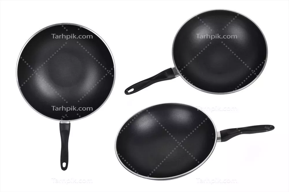 عکس تجربه ای دلپذیر از آشپزی با تابه خالی بر روی سطح سفید