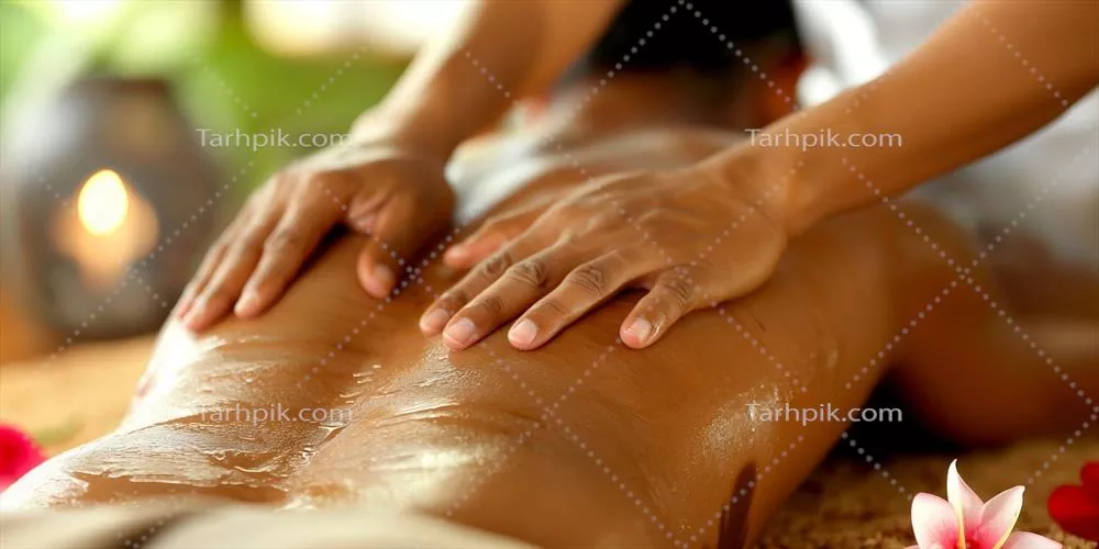 عکس ماساژ کامل بدن در یک محیط آرامش بخش با عطر و گل ها