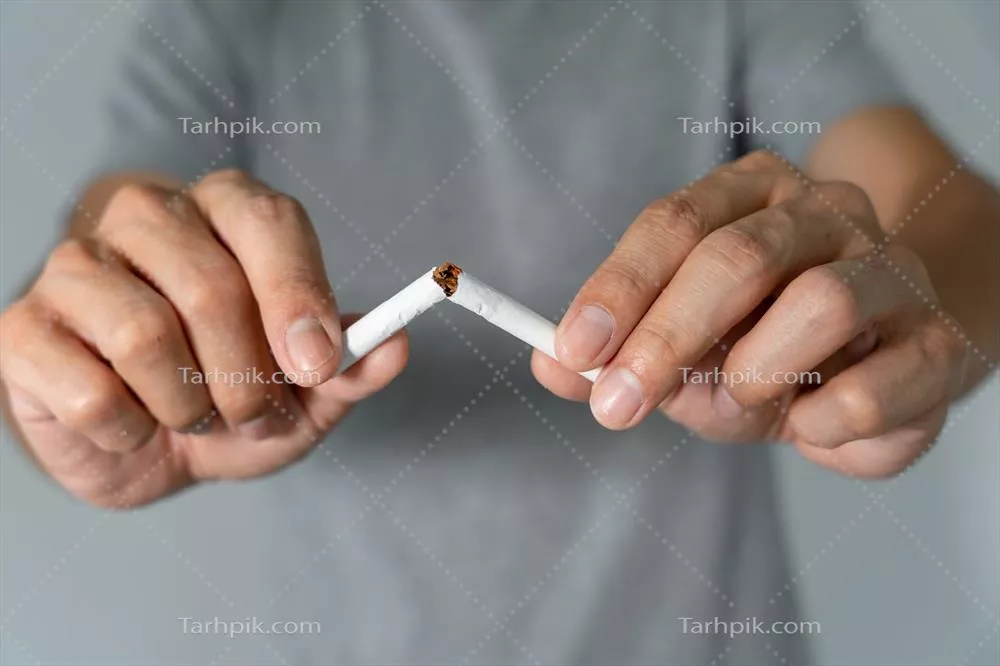 عکس مردی که سیگار را کنار گذاشته و به سلامتی خود اهمیت می دهد