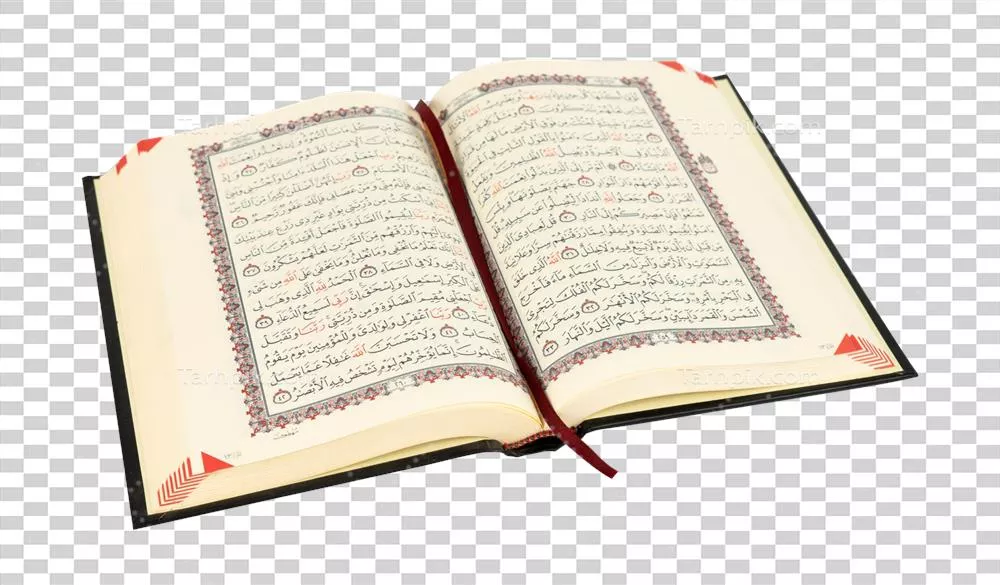 عکس دوربری کتاب قرآن باز: نماد دانش و نور در زندگی روزمره