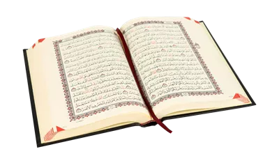 عکس دوربری کتاب قرآن باز: نماد دانش و نور در زندگی روزمره