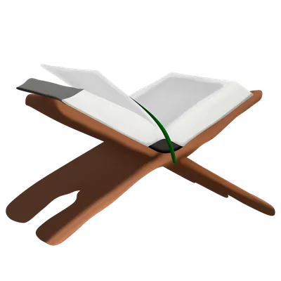 عکس دوربری مفهوم اسلامی قرآن کریم بر روی یک میز چوبی - کتاب مقدس مسلمانان