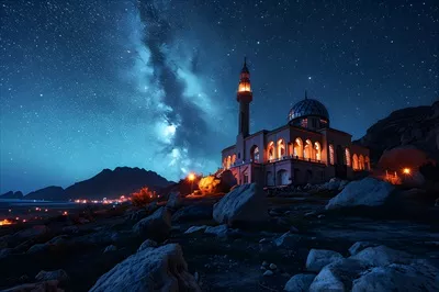 عکس تصویری زیبا از یک مسجد باشکوه در غروب آفتاب با آسمانی دل انگیز