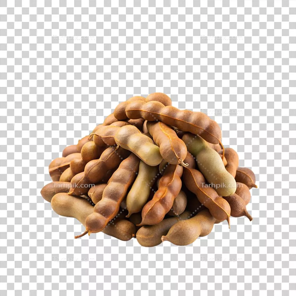 عکس دوربری تصویری زیبا از توده ای از میوه های تمرهندی با جزئیات دقیق