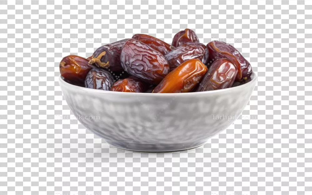 عکس دوربری یک کاسه از میوه های خشک خرما با طراحی خلاقانه و جذاب
