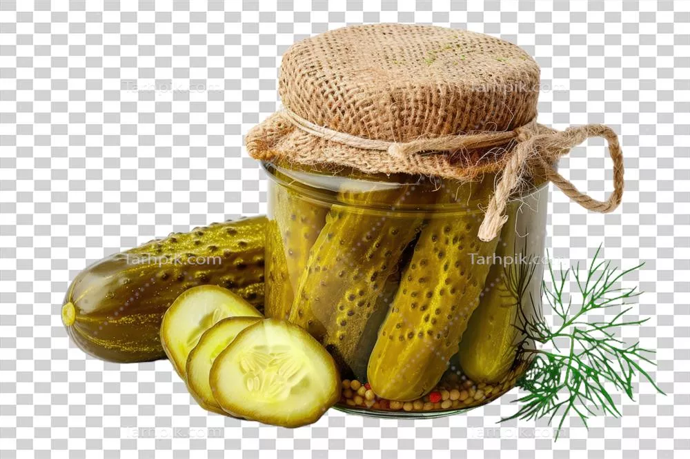 عکس دوربری ترکیب خوشمزه و ترد خیارشور با طعم دلپذیر در شیشه