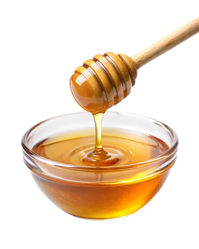 عکس دوربری عسل طلایی در حال چکیدن به داخل کاسه شیشه ای با نمایی زیبا
