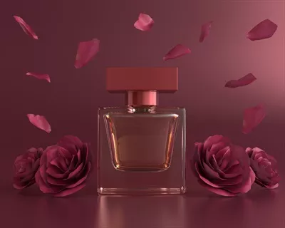 عکس تصویری زیبا از عطر با بطری قرمز و طراحی مد روز