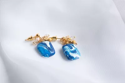 عکس گوشواره های دست ساز از خمیر پلیمر با طراحی مدرن و جذاب