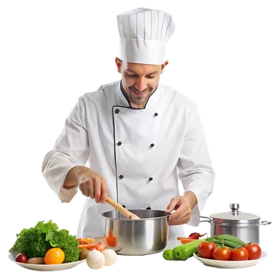 عکس دوربری سرآشپز مرد در لباس سفید در حال آماده سازی یک غذا با سبزیجات تازه
