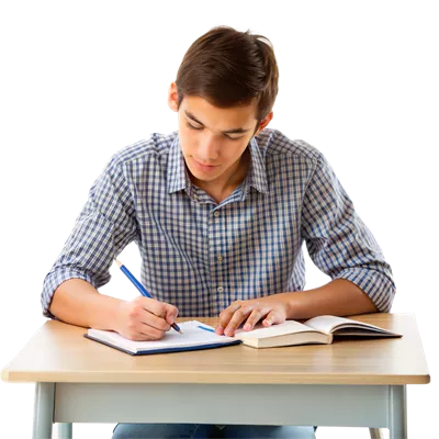 عکس دوربری پسر در حال تمرکز بر روی تکالیف درسی و انجام وظایف تحصیلی