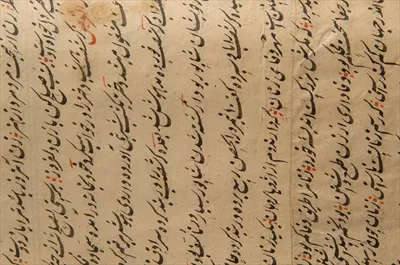 عکس کتاب قدیمی با خط عربی: بررسی نسخ خطی و متون تاریخی