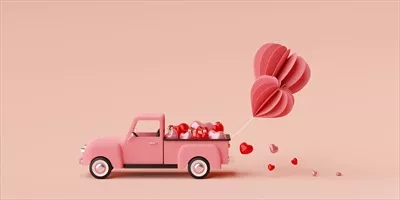 عکس تصویری زیبا از کامیونی پر از بادکنک های قلبی برای روز ولنتاین
