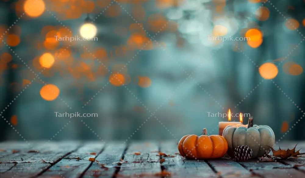 عکس دکوراسیون پاییزی با کدو تنبل و شمع در یک میز زیبا
