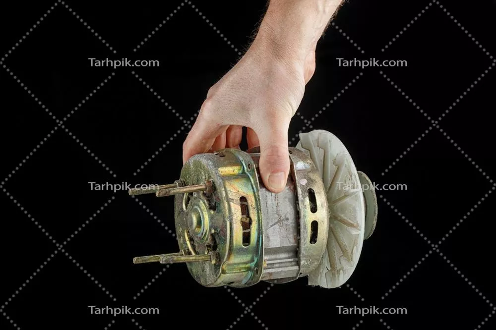 عکس موتور قدیمی الکتریکی از ماشین لباسشویی با طراحی خاص و جذاب