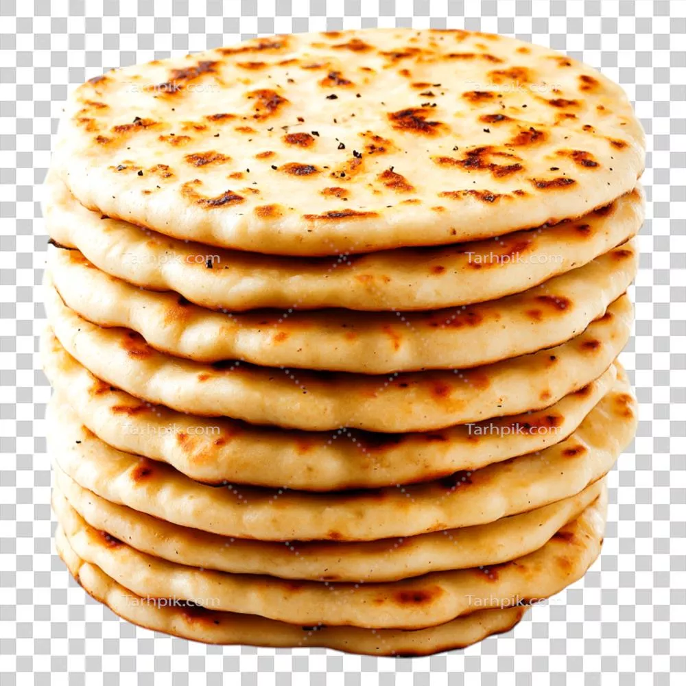 پشته‌ای از نان‌های لواش تازه پخته شده با سطحی قهوه‌ای طلایی