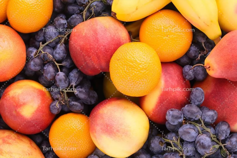 تصویر زمینه میوه‌های گرمسیری زیبا و متنوع با رنگ‌های شگفت‌انگیز