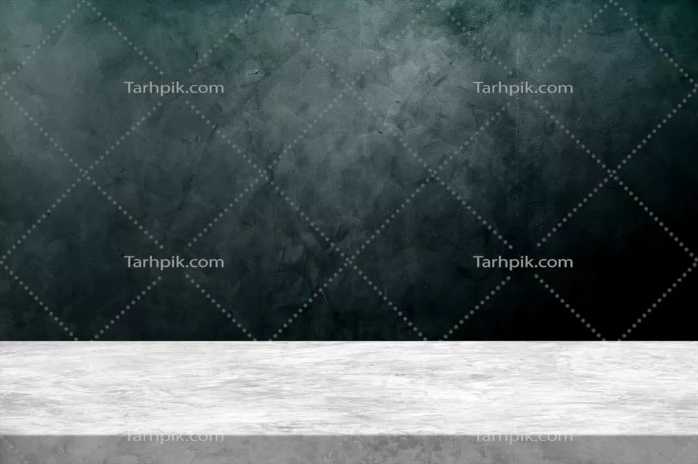 میز بتنی با پس‌زمینه دیوار بتنی رنگ آبی اقیانوسی به تدریج
