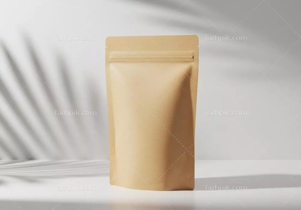ماکت کیسه کاغذی کرافت با سایه برگ نخل بر روی پسزمینه سفید