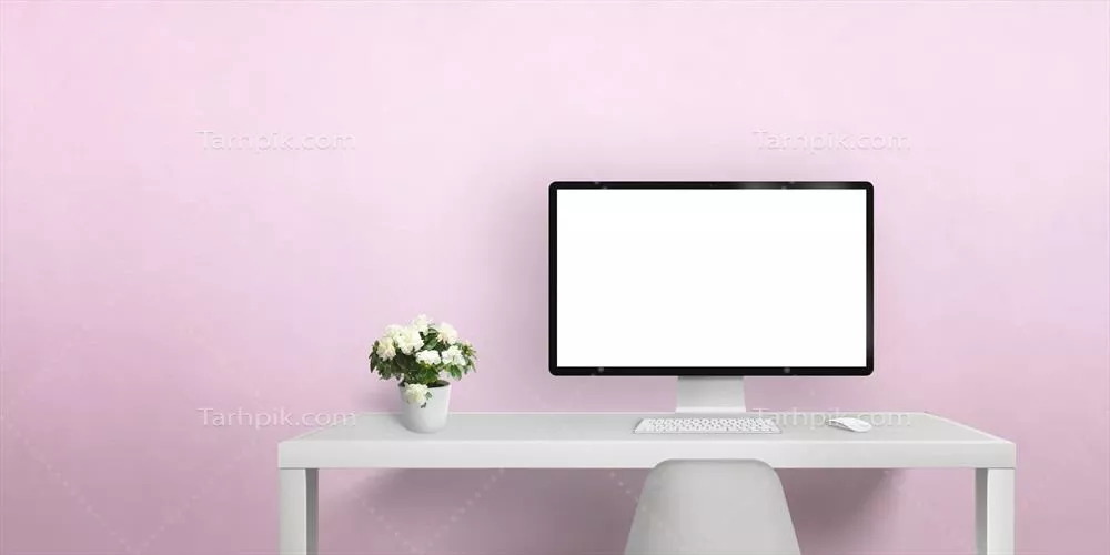 صفحه نمایش مدرن کامپیوتر روی میز سفید و دیوار صورتی برای طراحی و تبلیغات وب