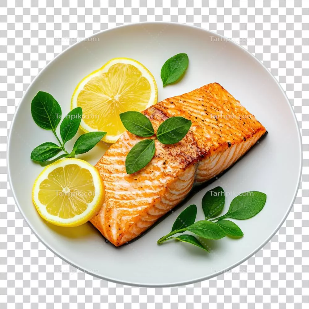 فیله سالمون خوشمزه بر روی پسزمینه شفاف با garnishing لیمو و سبزیجات تازه؛ مناسب برای علاقهمندان به غذا و نوشیدنی