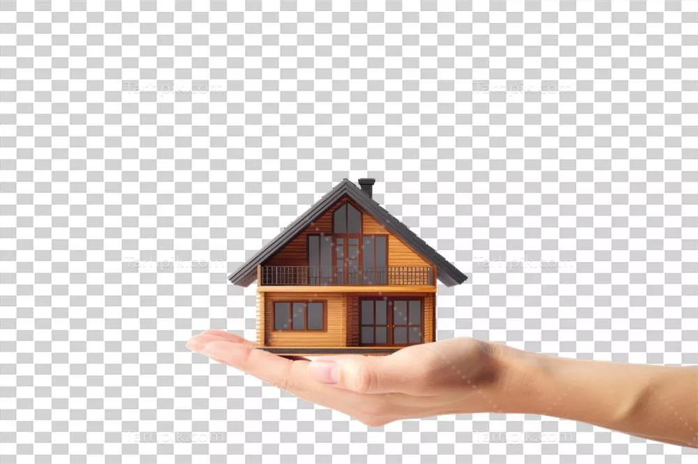 دست در حال نگه داشتن یک خانه کوچک بر روی پس‌زمینه شفاف