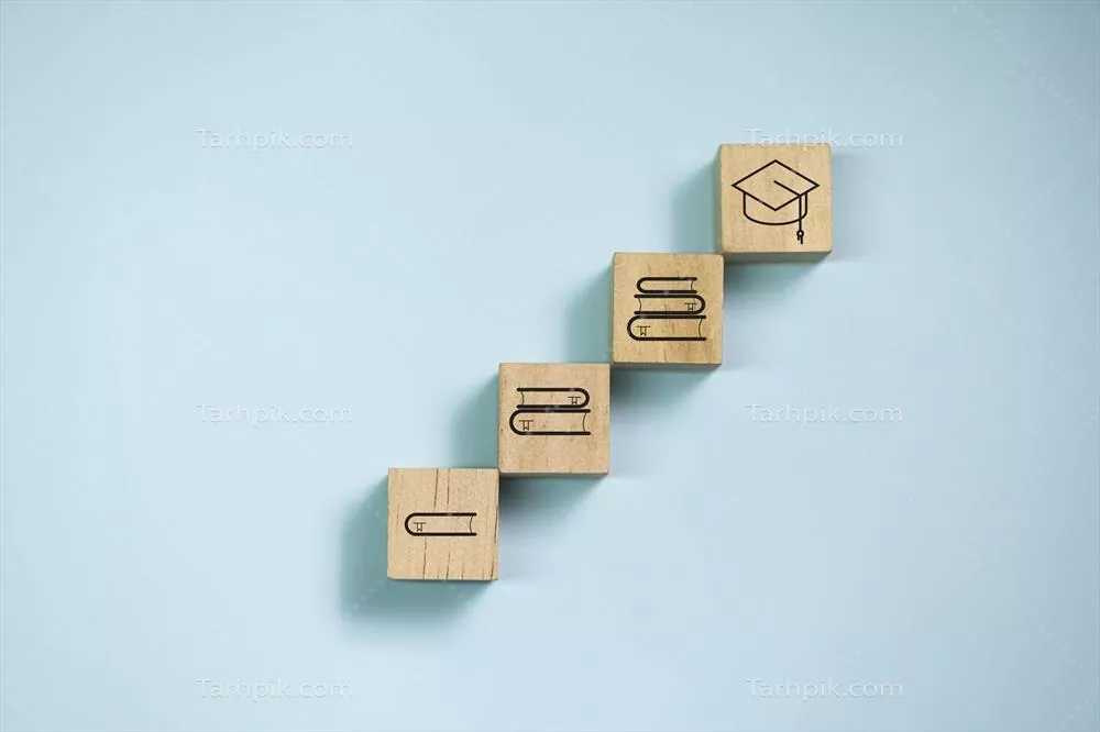 مجموعه بلوک های چوبی آموزشی با آیکن های کتاب و فارغ التحصیلی