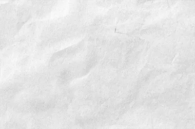 پس زمینه بافت کاغذی چروکیده سفید به صورت نزدیک
