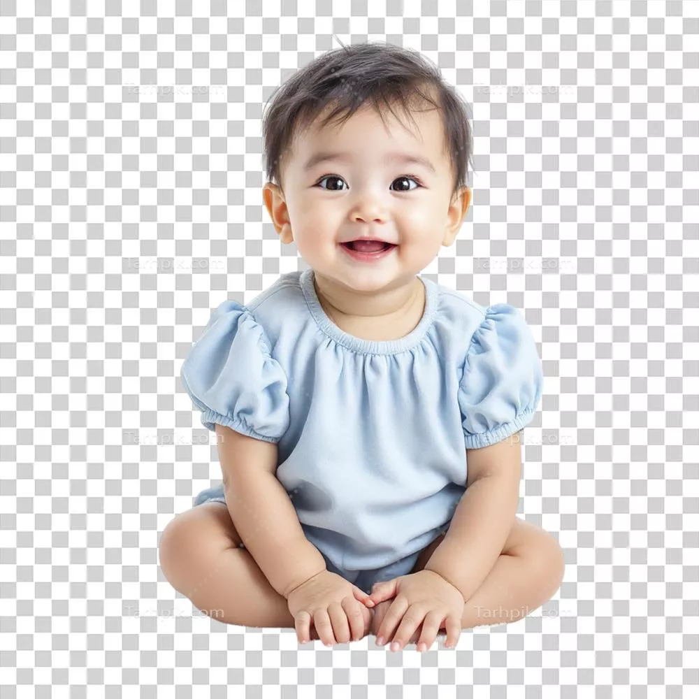 کودکی نشسته بر روی زمین با تی شرت آبی رنگ