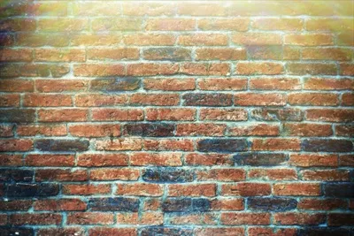 پسزمینهای از بافت دیوار آجری برای طراحی و کارهای هنری
