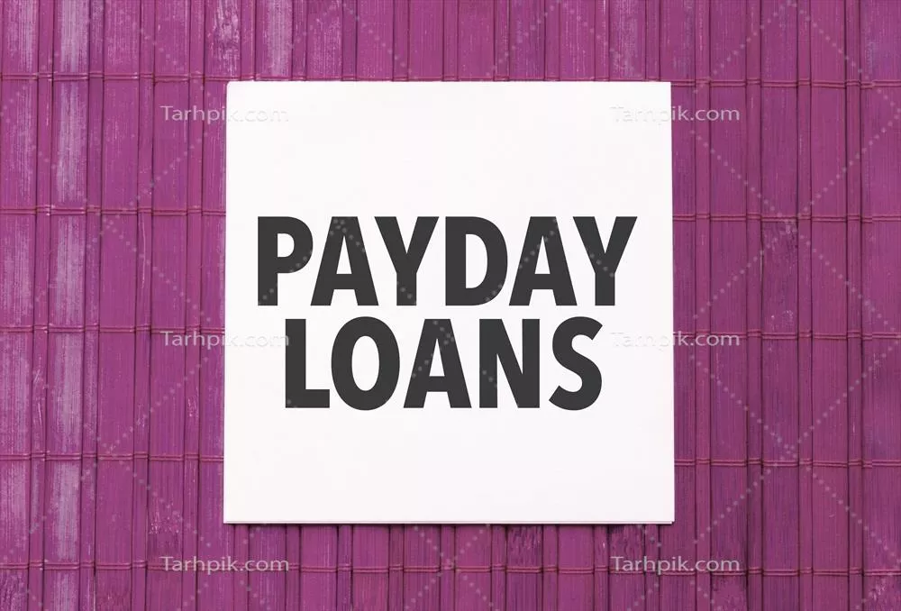 برچسب سفید با متن وام روز حقوق بر روی پسزمینه چوبی صورتی