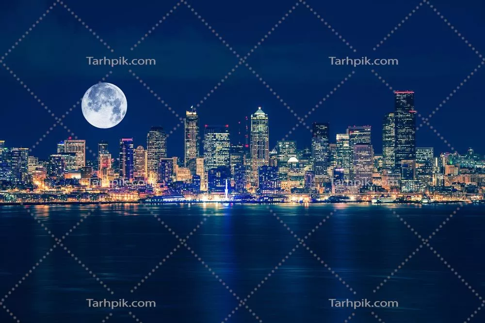 منظر زیبای سیاتل و ماه در آسمان شب - تصویر باشکوه شهر