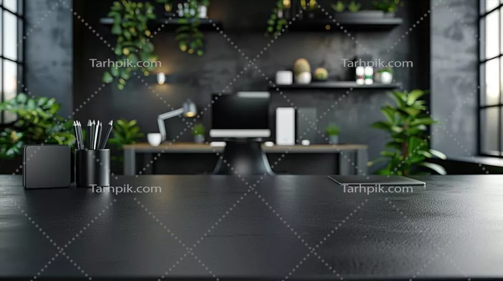 میز مشکی صاف و براق با دستگاه‌های اداری محو در پس‌زمینه برای نمایش فناوری‌های روز