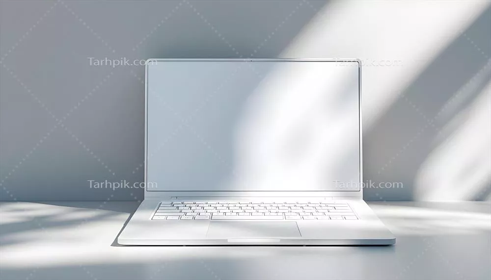 ماکت لپتاپ سفید در نور خورشید با طراحی مینیمالیستی
